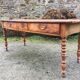 Old cherry farmhouse table with 3 drawers and turned legs