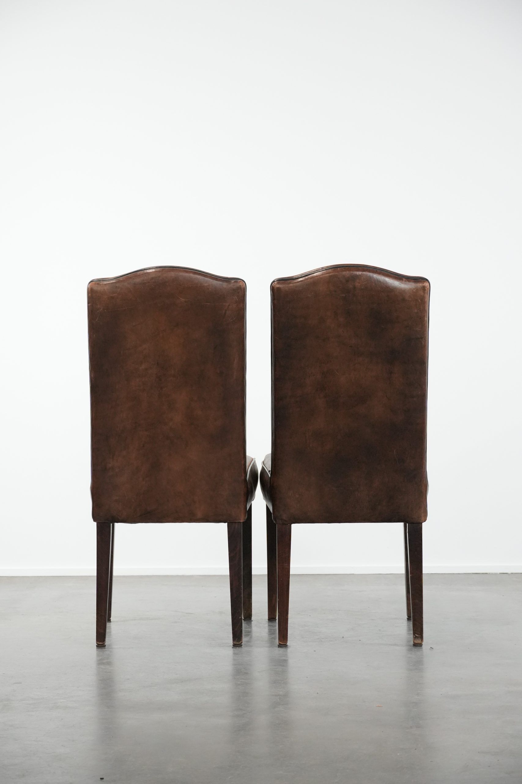 Great set of 8 stylish vintage sheepskin dining chairs with character