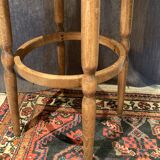 High curved wooden stool