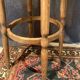 High curved wooden stool