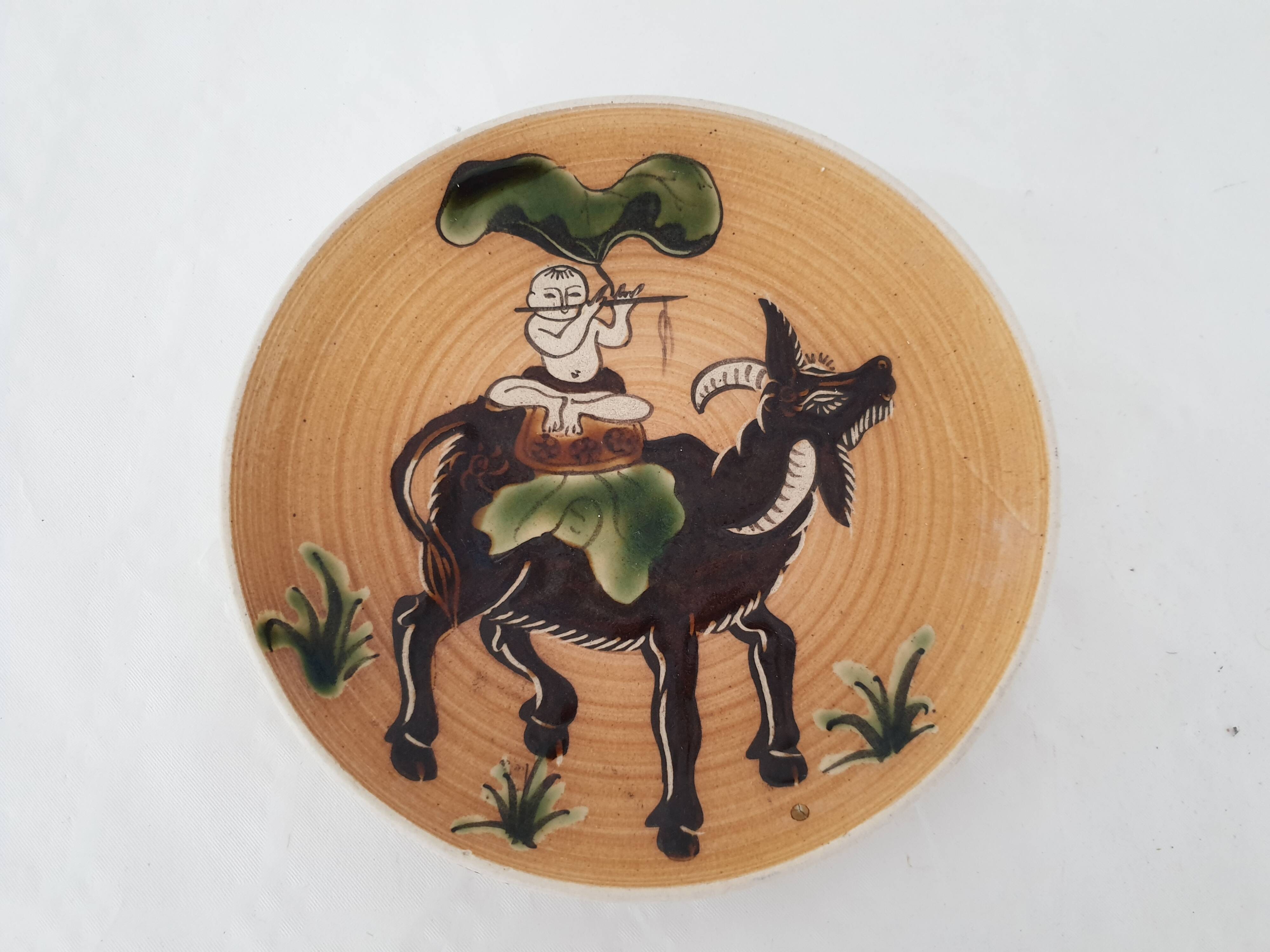 Ceramic plate sacred cow Buddha Vietnam