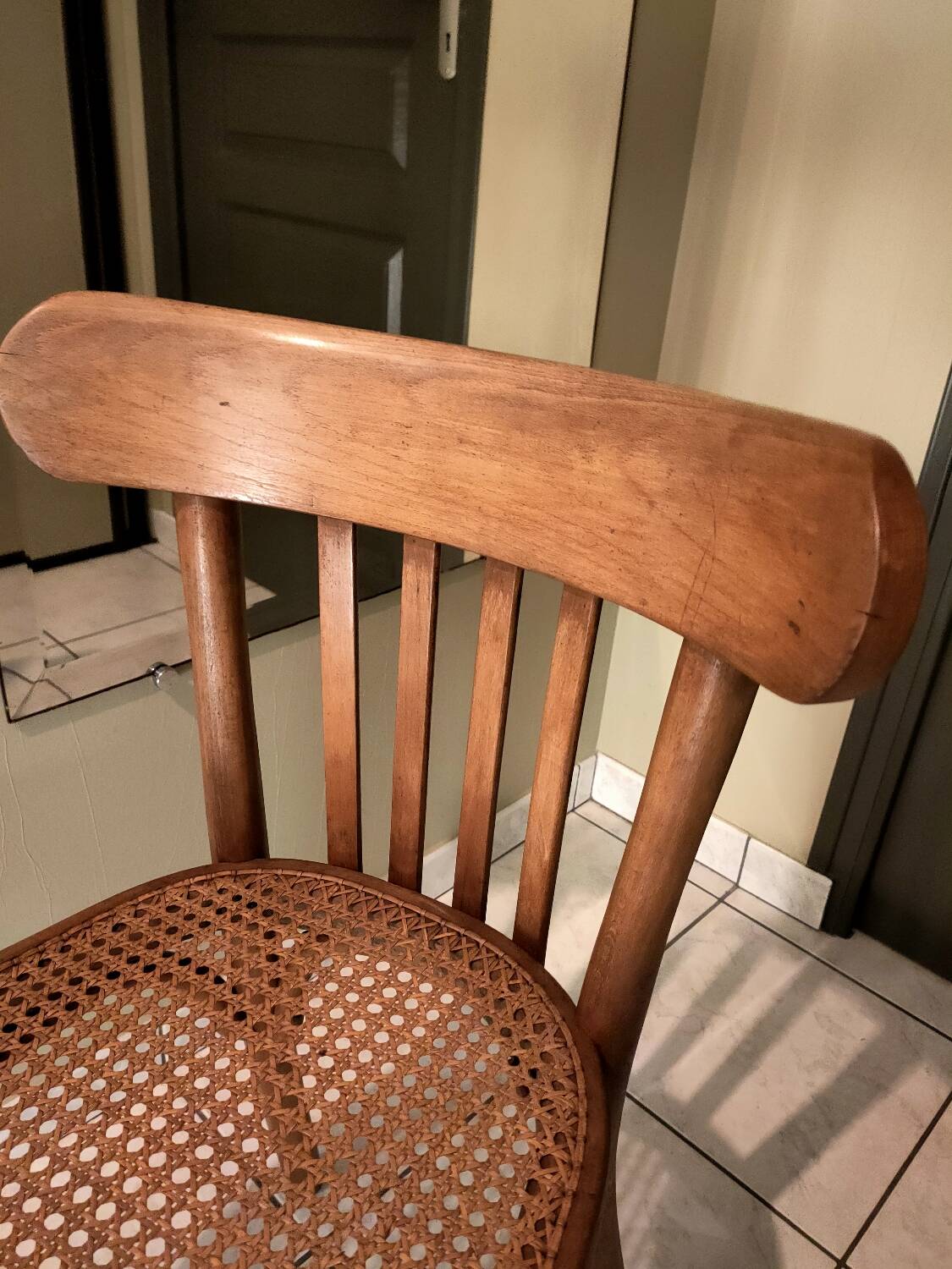 Old bistro chair with caned seat