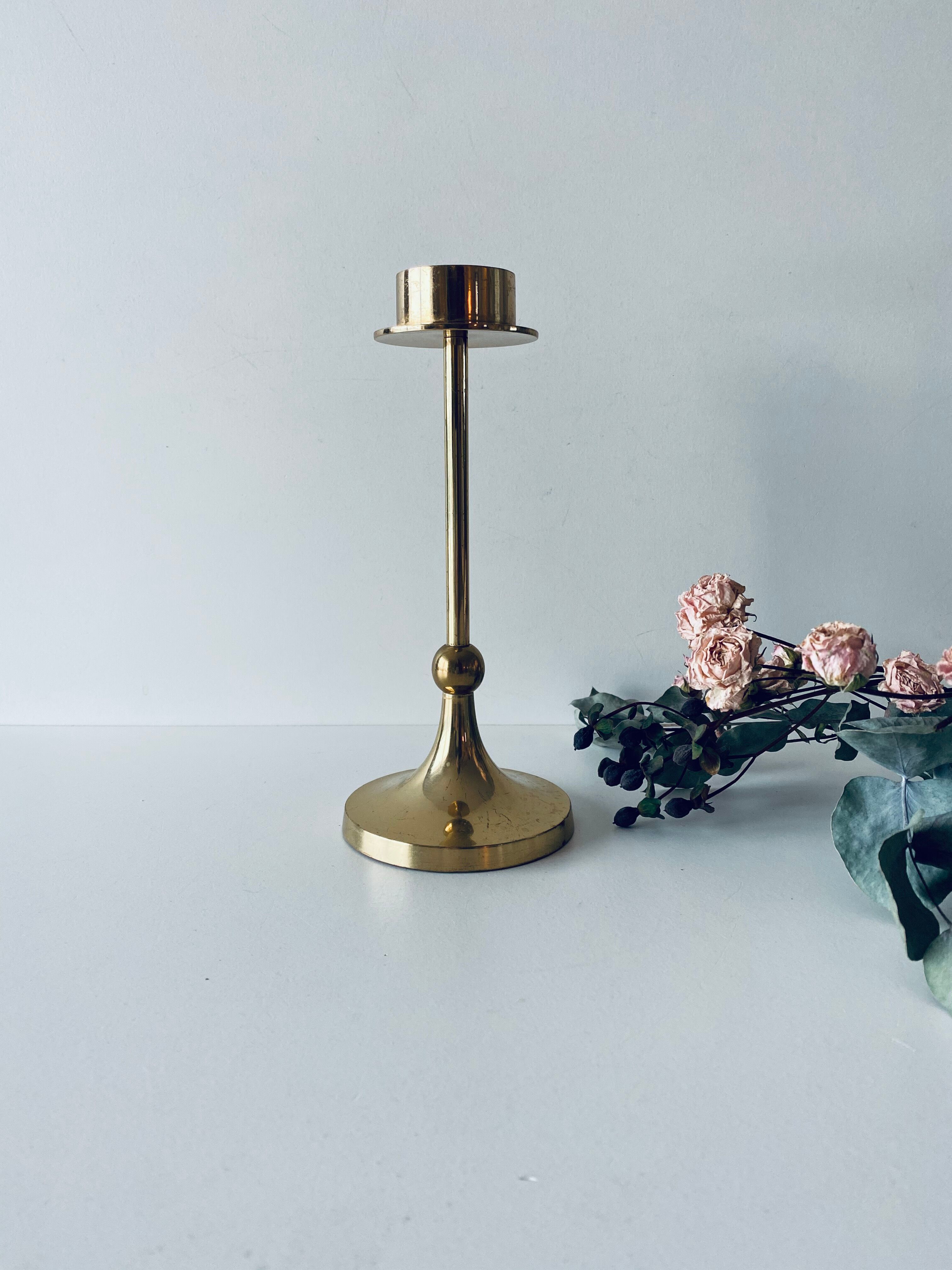 Golden brass candle door