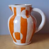 Old enamelled ceramic jug