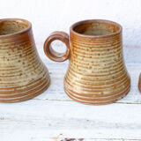 4 sandstone cups signed Jean Pierre Prudhomme