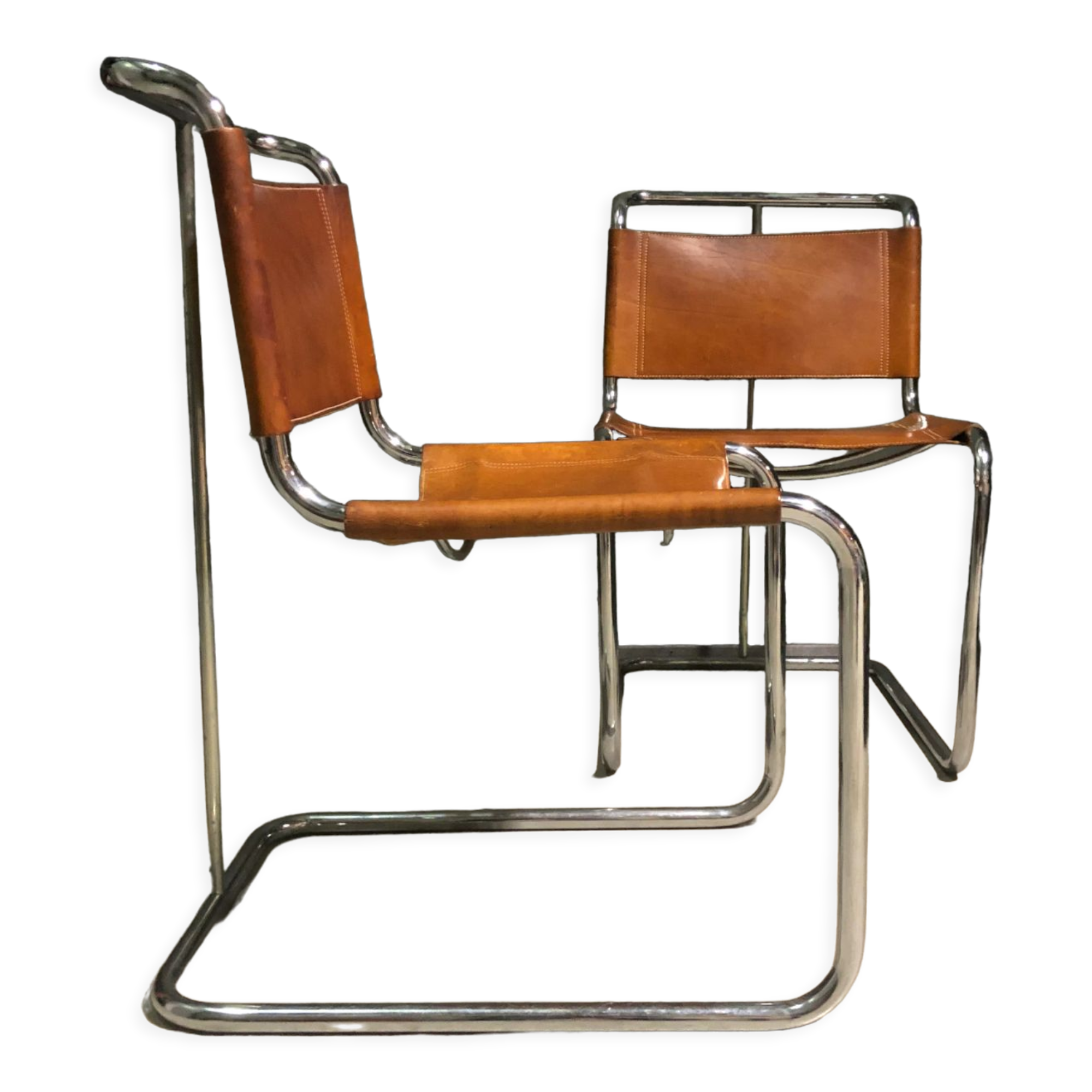 A pair of chromed tubular dining chairs 1980's