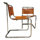 A pair of chromed tubular dining chairs 1980's