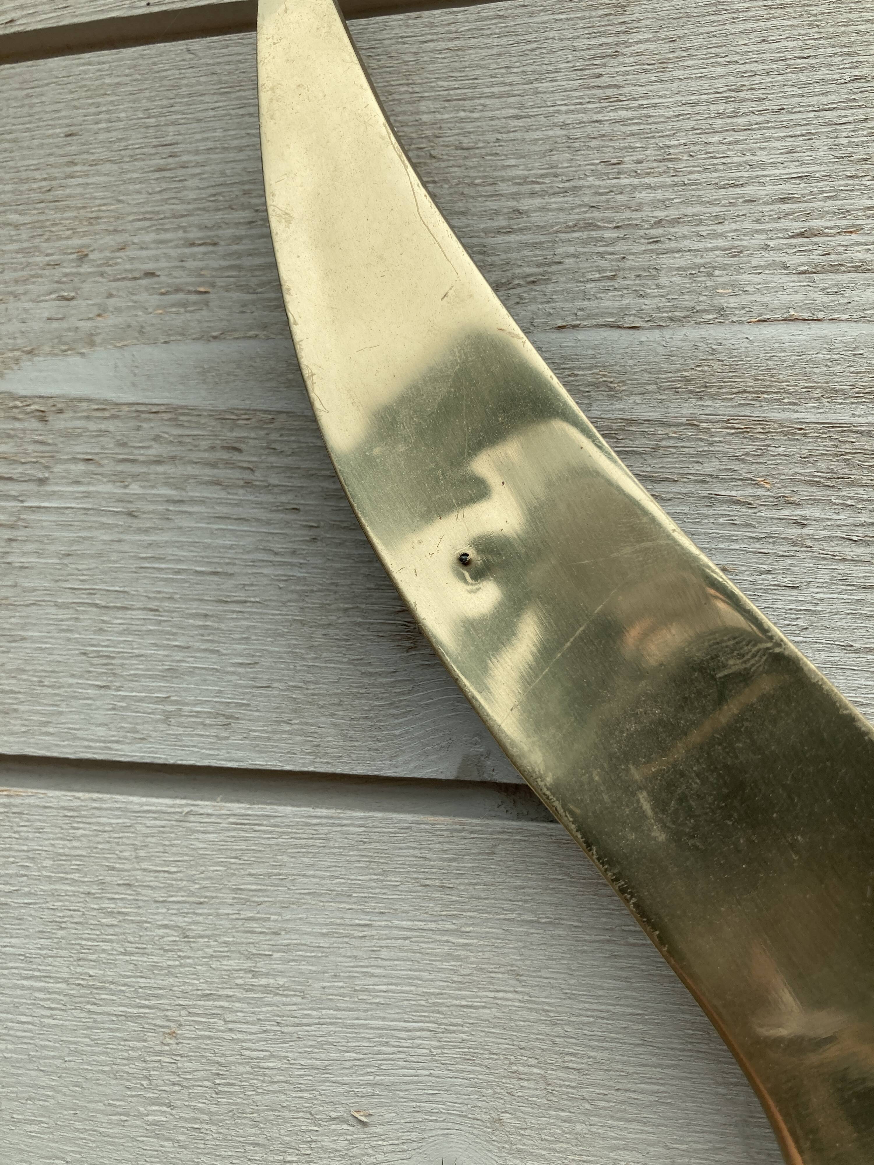 Bird brass and sun bronze wall decoration