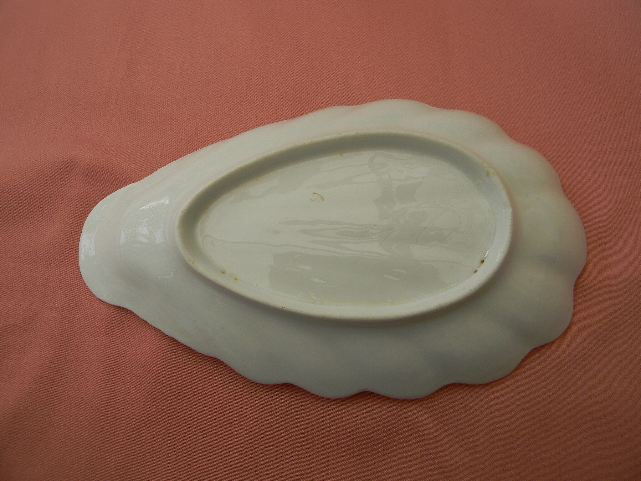 Old white porcelain ravier.