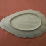 Old white porcelain ravier.