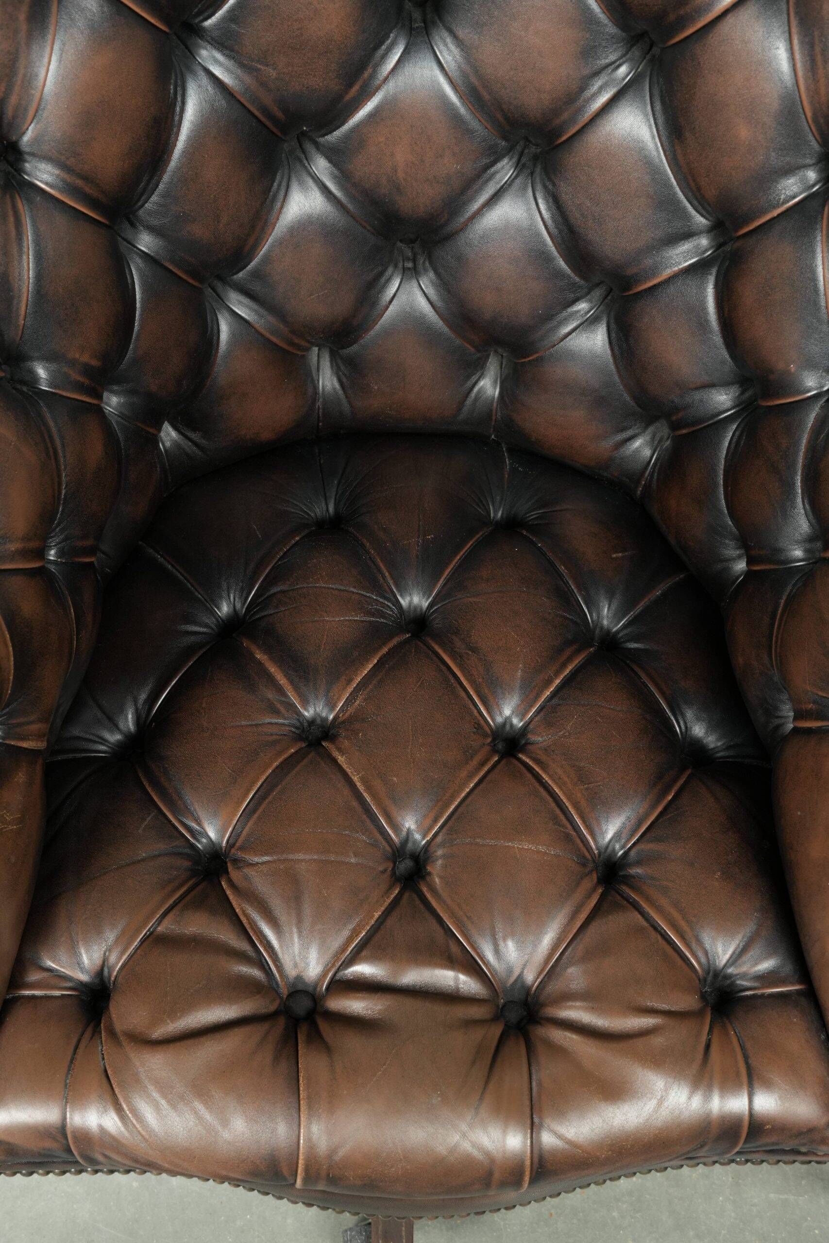 Vintage Chesterfield office chair with decorative nails in English style