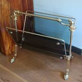 porte revues en bronze et verre teinté 1950 à pieds griffés