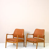 Pair of vintage Danish teak and leather armchairs