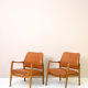 Paire de fauteuils vintage danois en teck et cuir