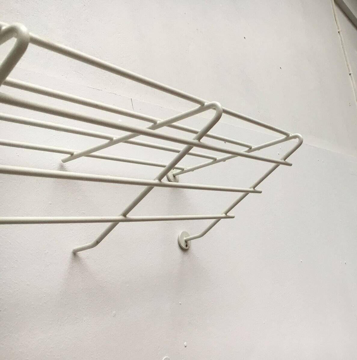 Mid-century modern minimalist metal coat rack from the 1960s.