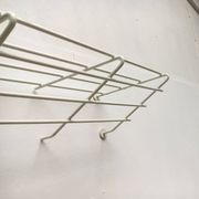 Mid-century modern minimalist metal coat rack from the 1960s.