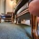 Pair of vintage Chesterfield club armchairs in brown tufted leather –