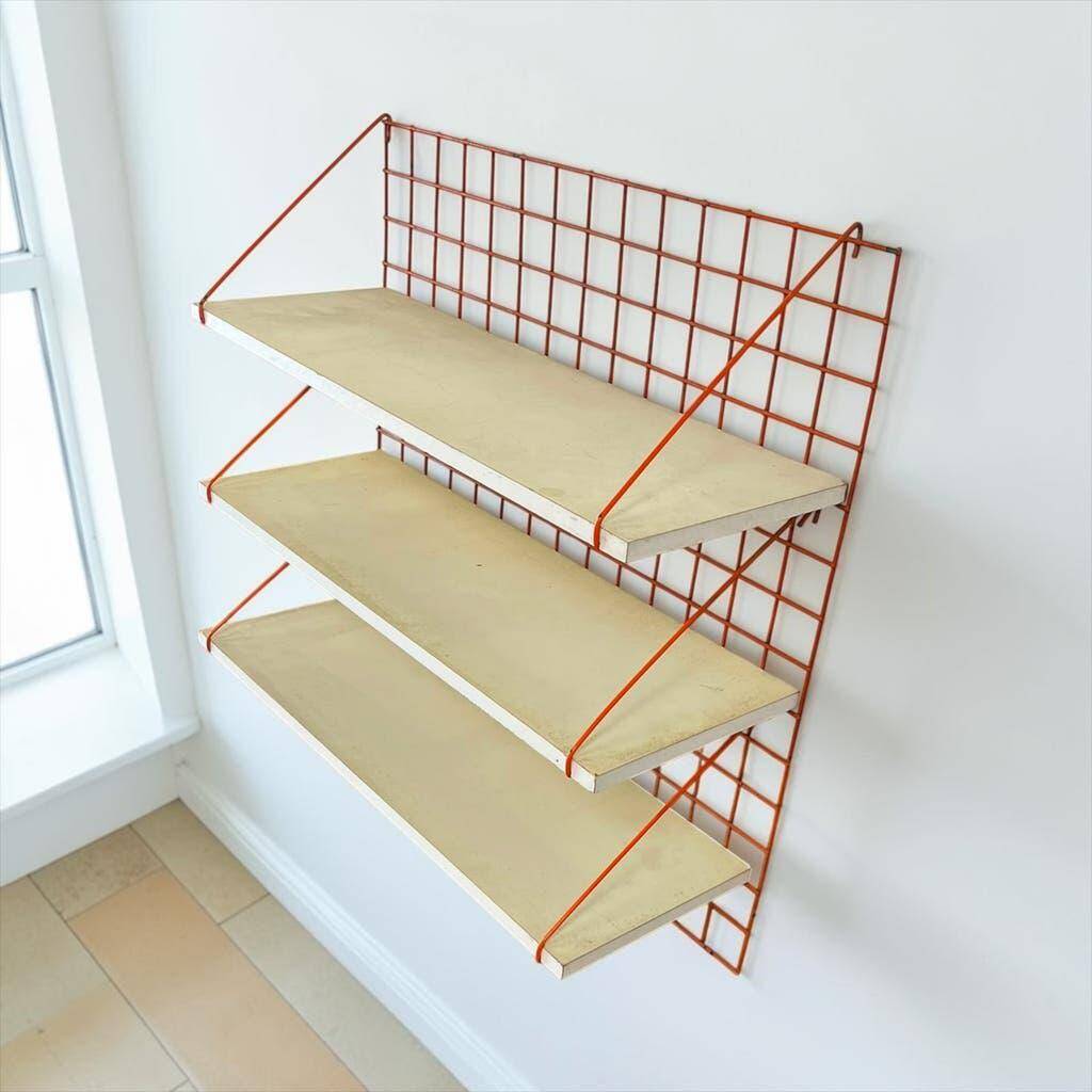 Vintage orange-red multi-level wall shelf with grid