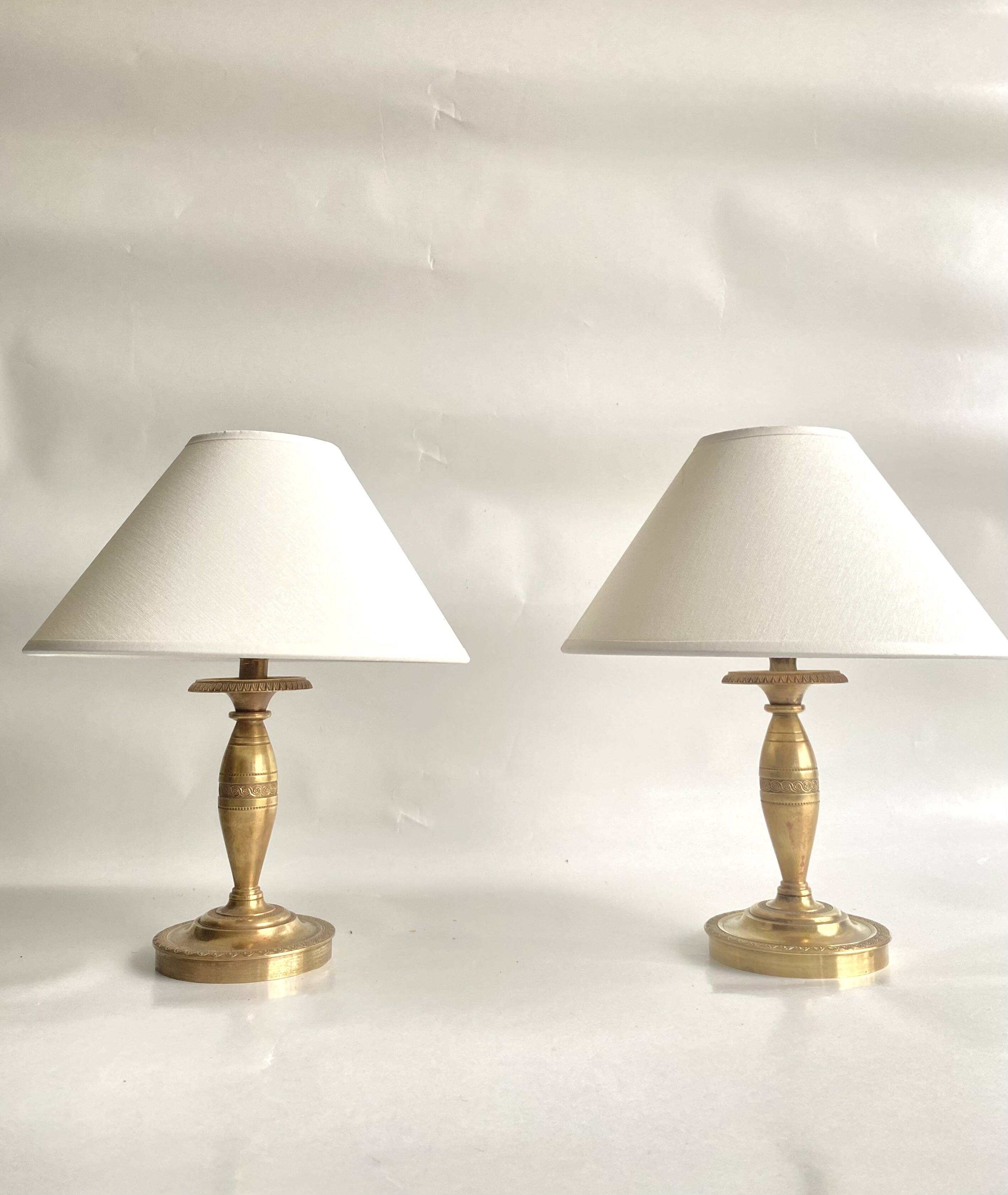 2 brass lamps