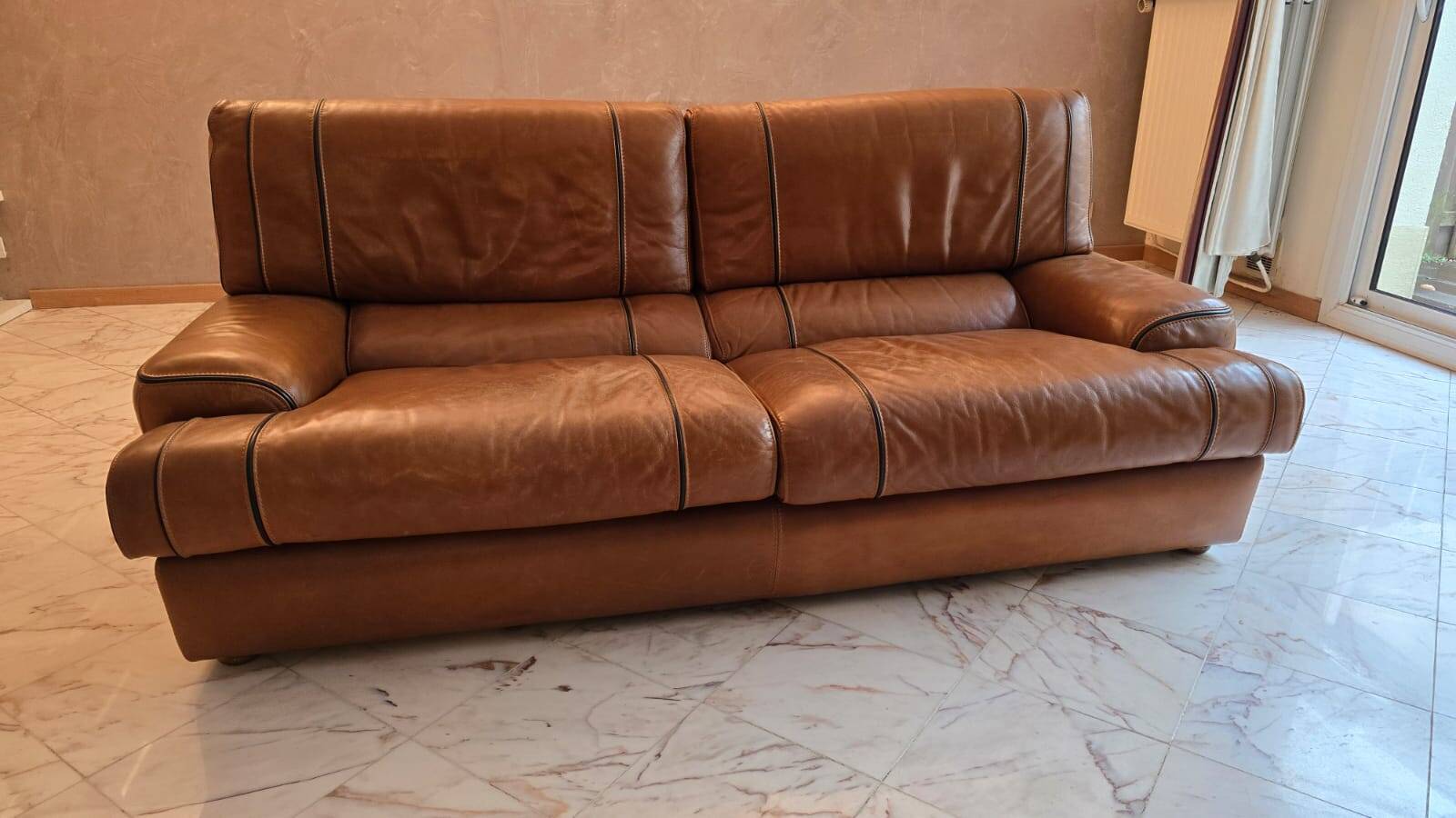 Three-seater leather sofa