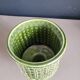 Ceramic flowerpot on stand