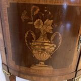 Louis XVI style half-moon chest of drawers in late nineteenth century marquetry