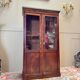 Display cabinet forming a mahogany card index from the restoration period