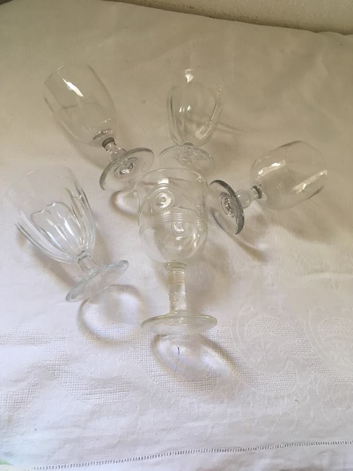 Together five mismatched stemware