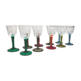 Antique and rare! Sold in a set of 12 colorful twisted stemmed glasses engraved with flowers and leaves