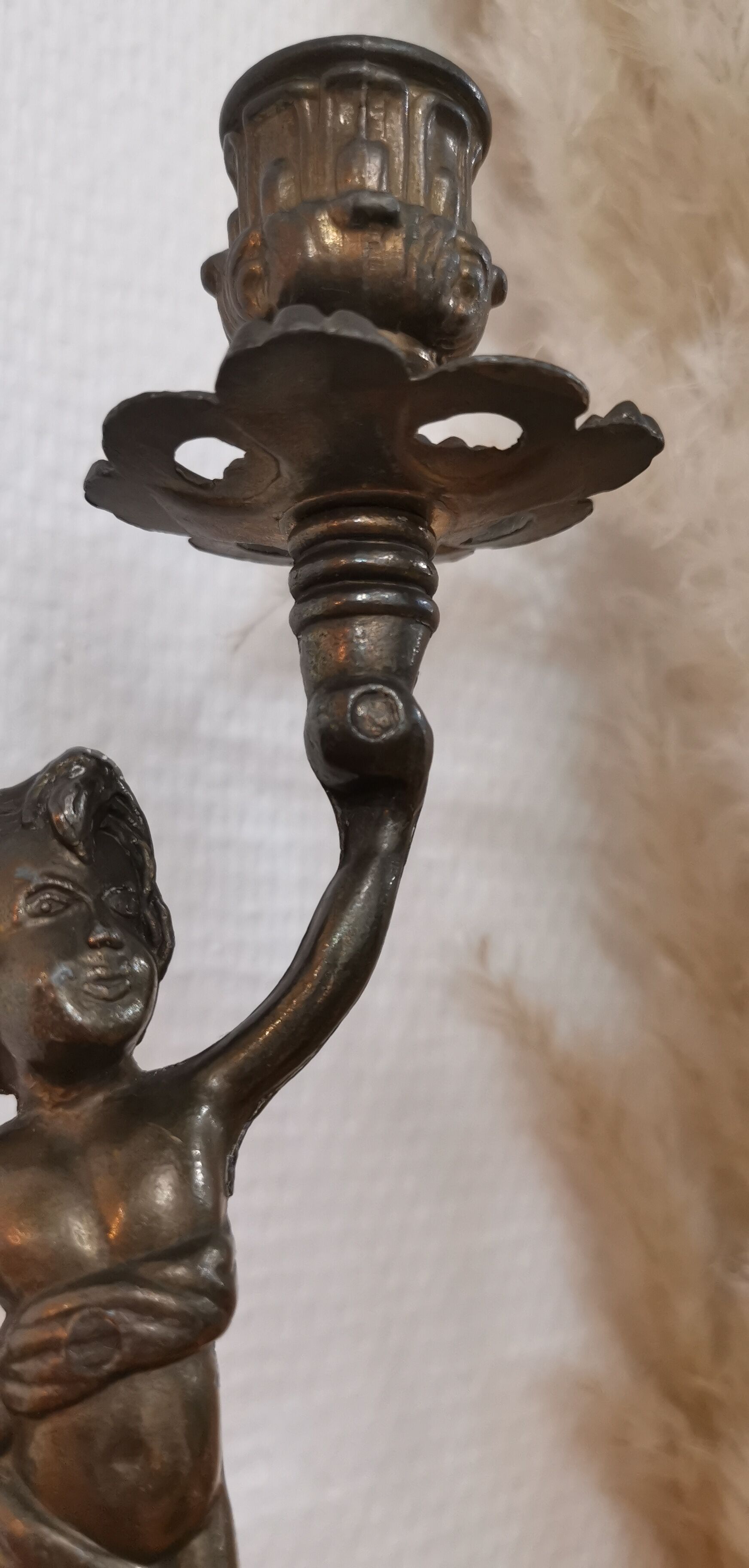 Pair of antique candlesticks in bronze and brass