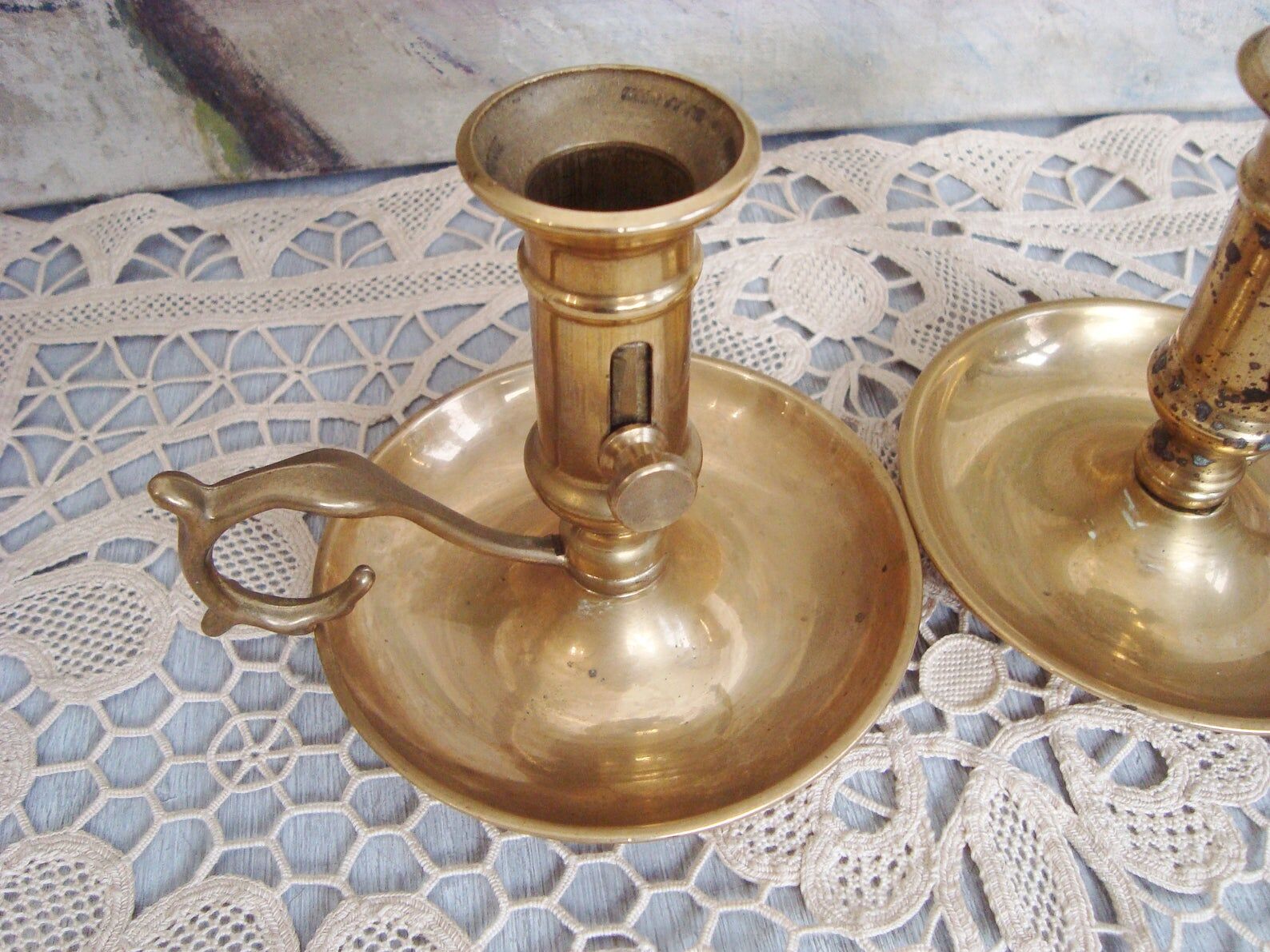 Pair of brass cellar rat candlesticks