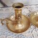 Pair of brass cellar rat candlesticks