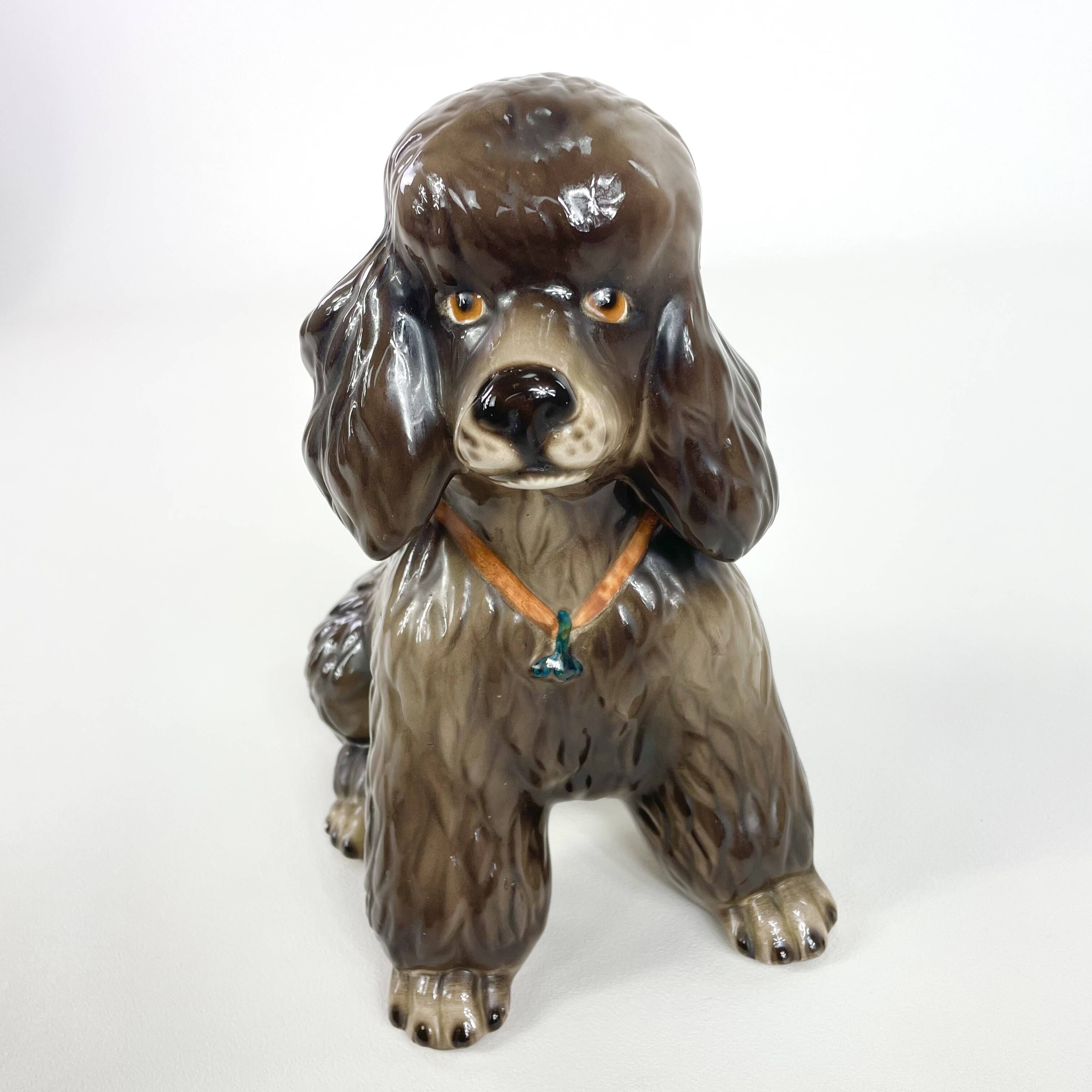 Pair of glazed ceramic poodles, circa 1950