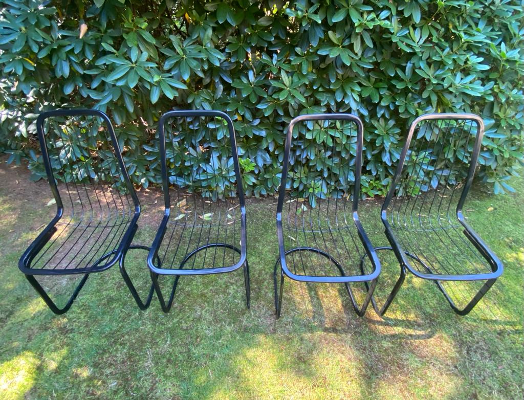 Set of four black highback dining chairs,  1970s