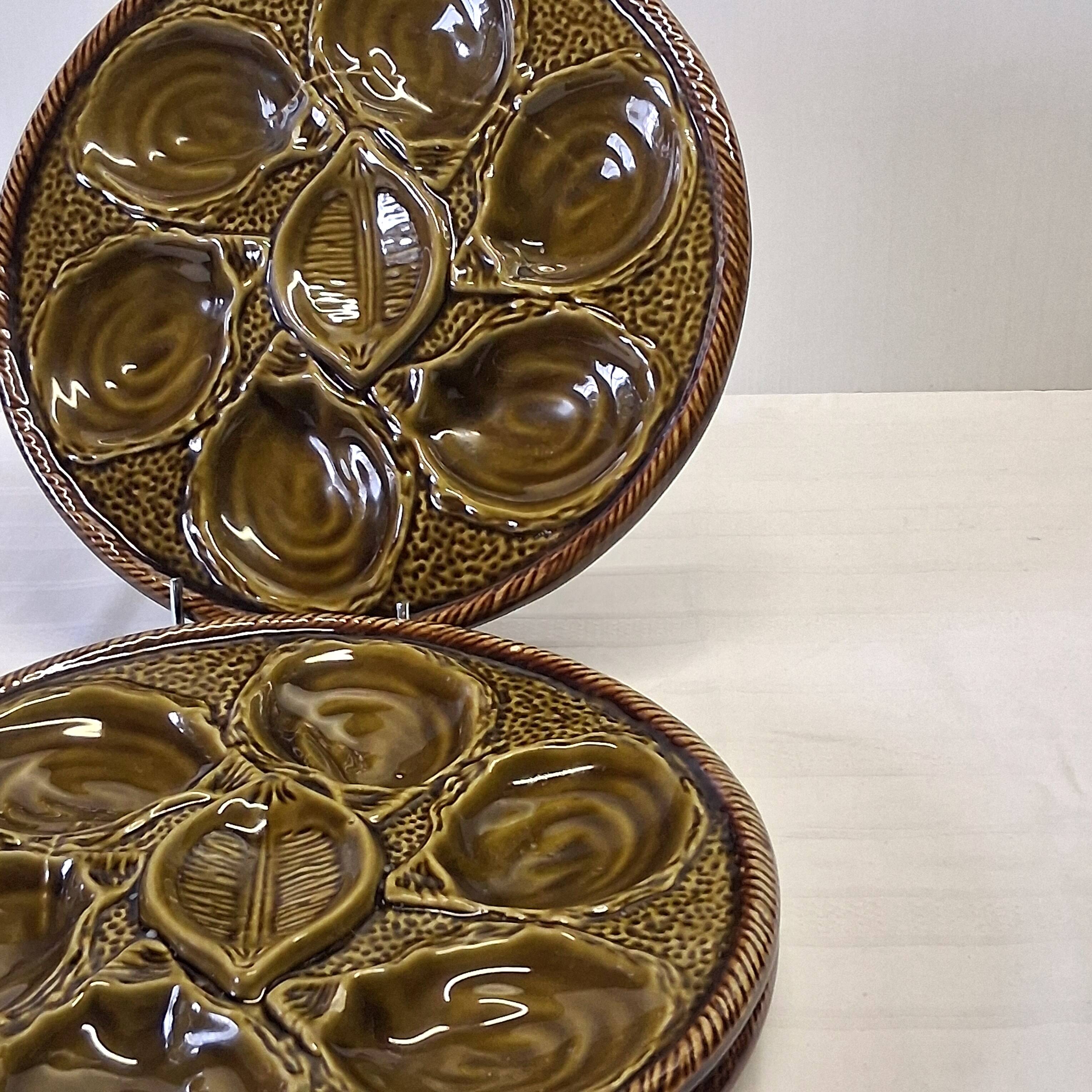 3 green majolica oyster plates from St Clément in good condition.