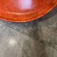 A vintage 70s Eames Herman Miller DSW Fiber Red Orange Dowel Walnut Chair