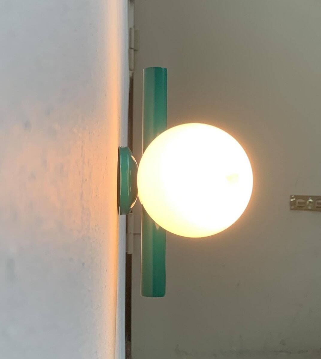 Mid-century German space age wall lamp by Kaiser Idell / Kaiser Leuchten.