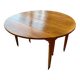 Extendable round table in solid walnut, 125cm in diameter, 5 extensions.