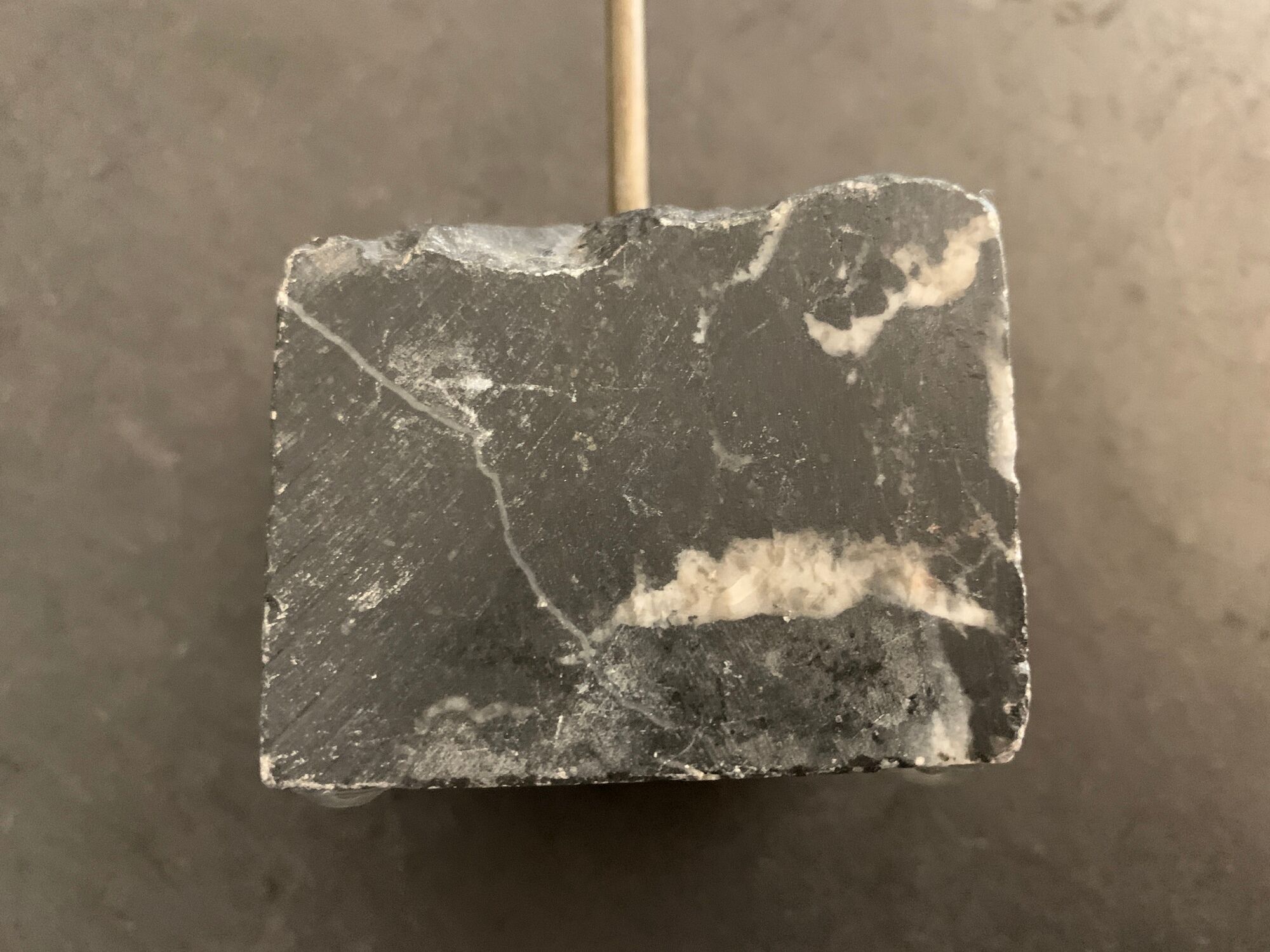 Swedish design candle holder in granite, metal and brass, 1980, height 39 cm