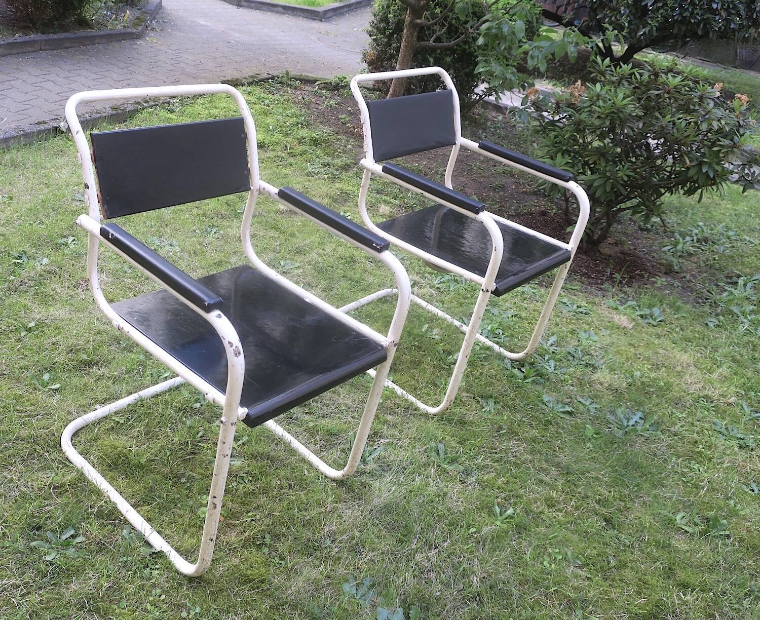 Pair of mid century iron and wood painted garden chairs