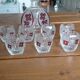 Vintage liqueur service in decorated red glass – decanter and 7 glasses