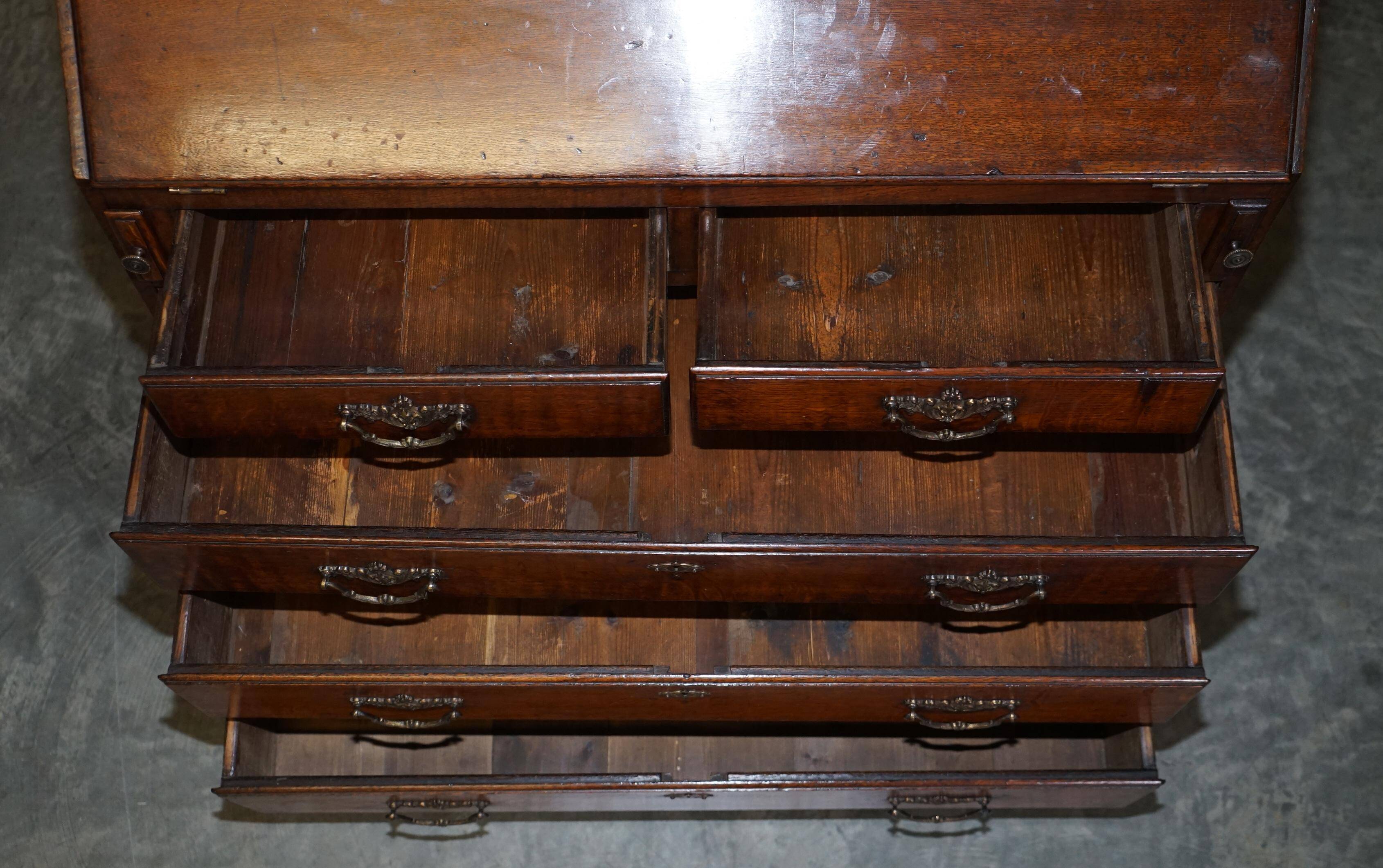 George III oak secretary bookcase circa 1760, Thomas Chippendale style.