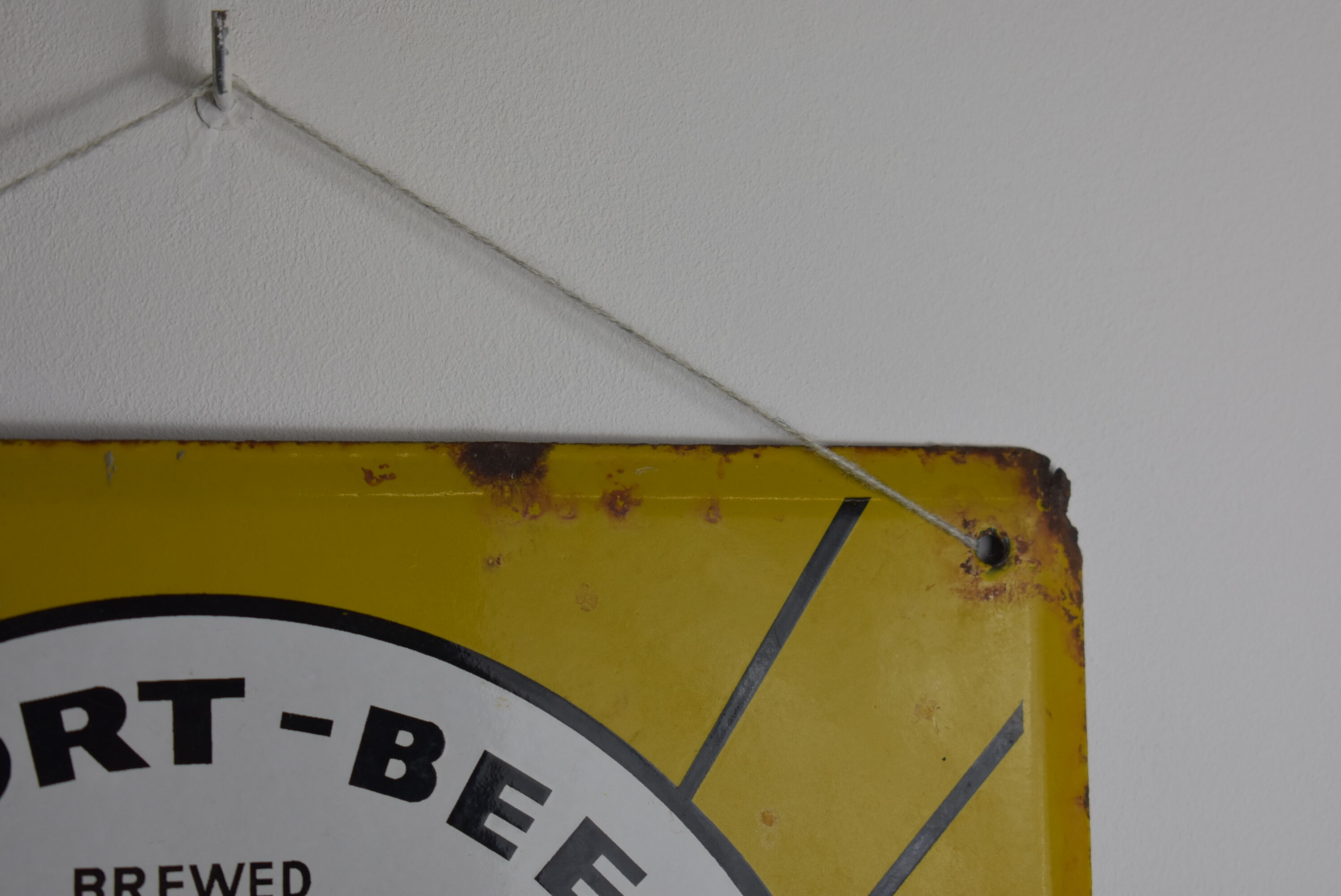 Stella Pils beer enamelled plate