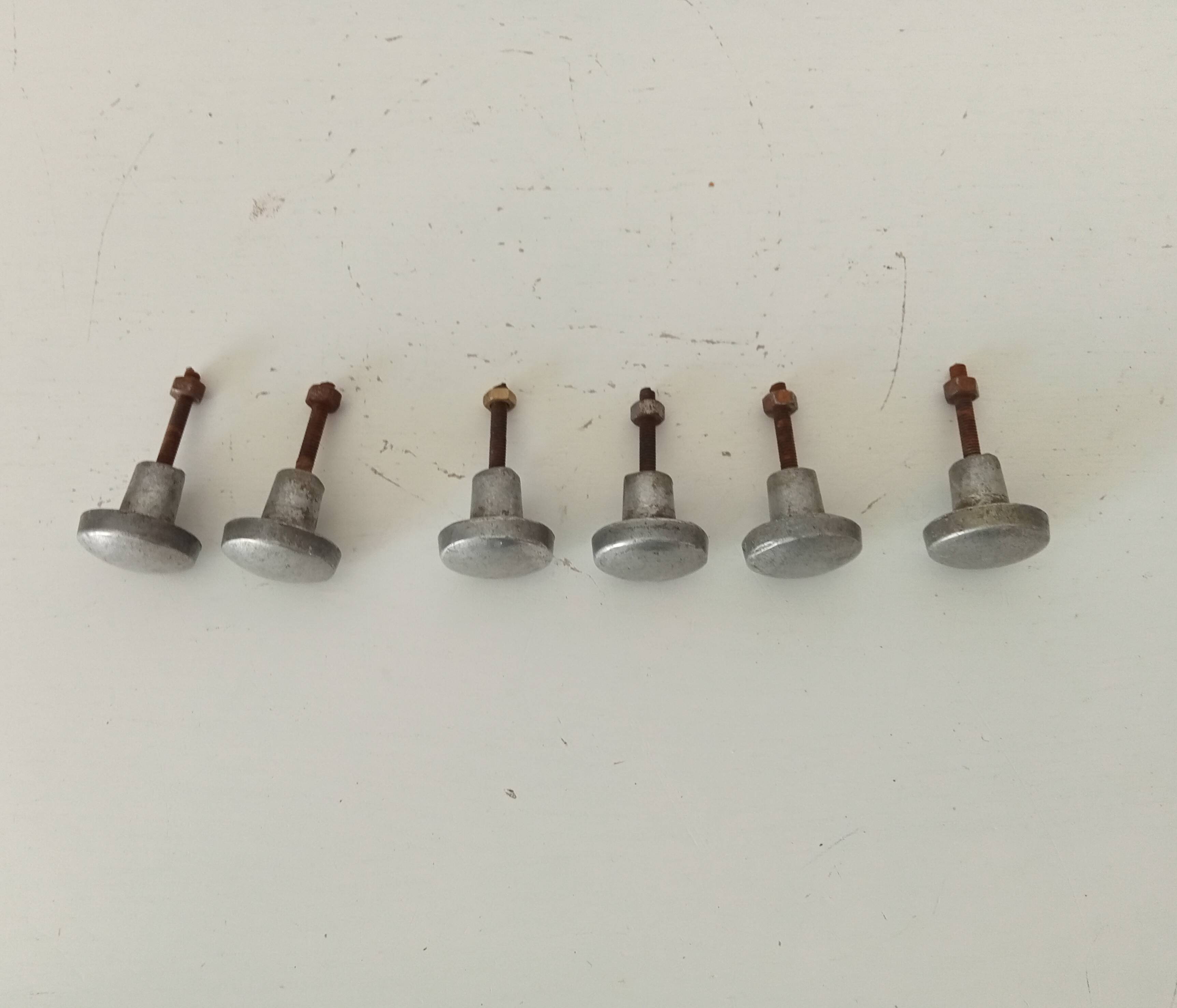 Pair of antique solid aluminium furniture handles.