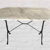 Oval marble and cast iron bistro table
