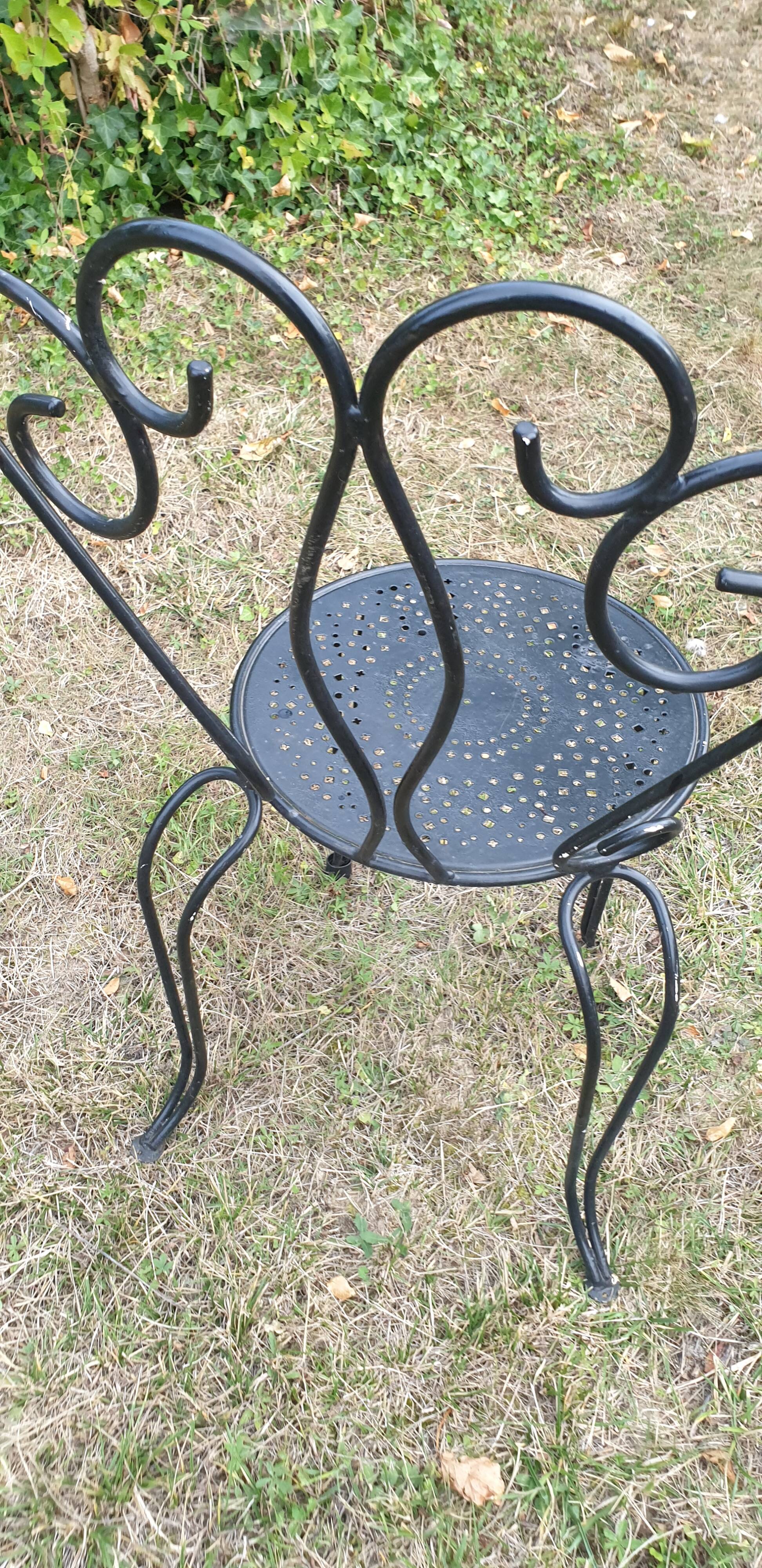 1 ornate wrought iron garden chair