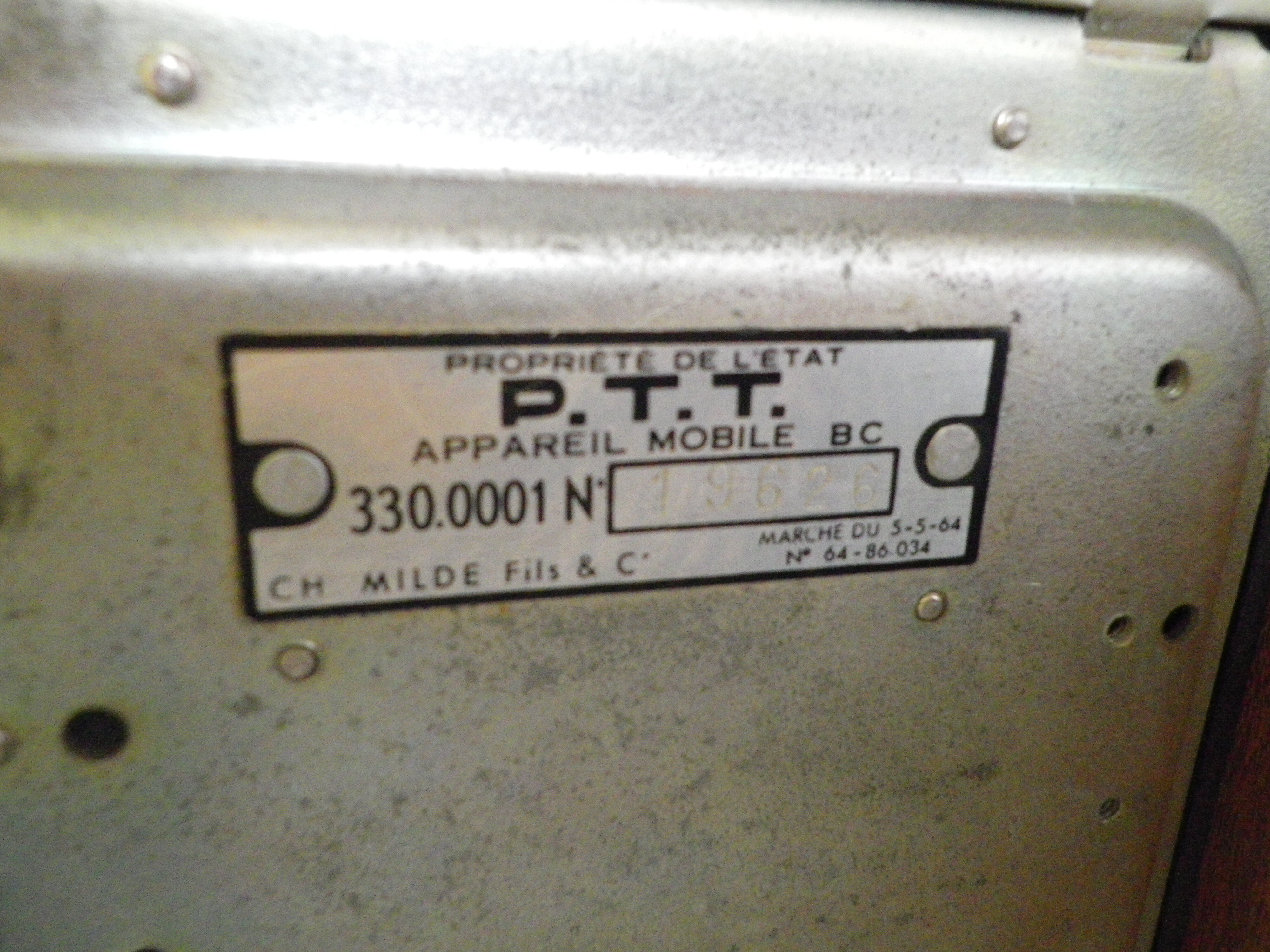 Black bakelite phone with earphone