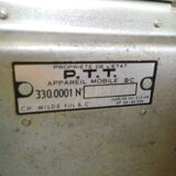 Black bakelite phone with earphone