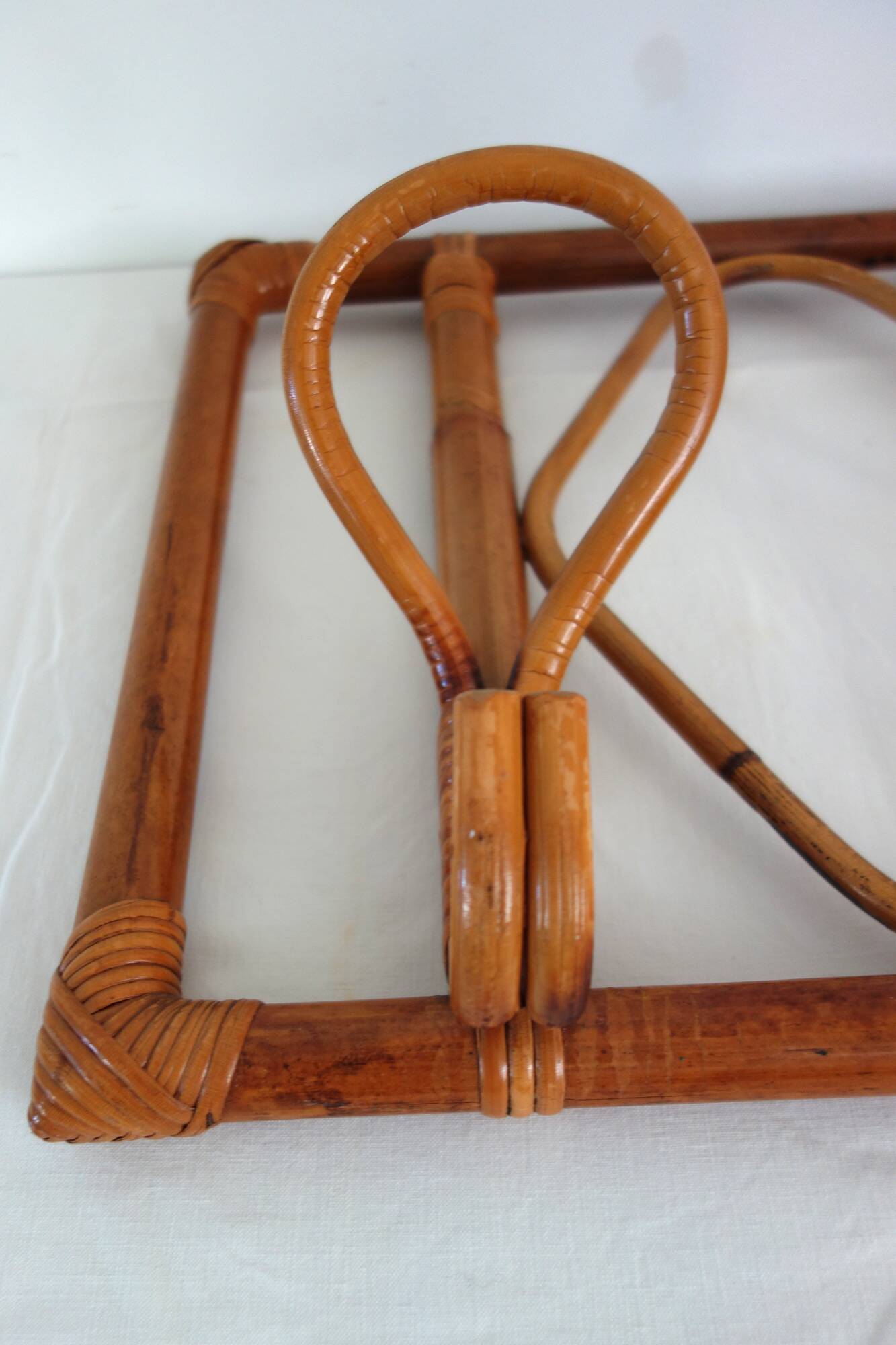 Vintage wall coat rack in bamboo and rattan.