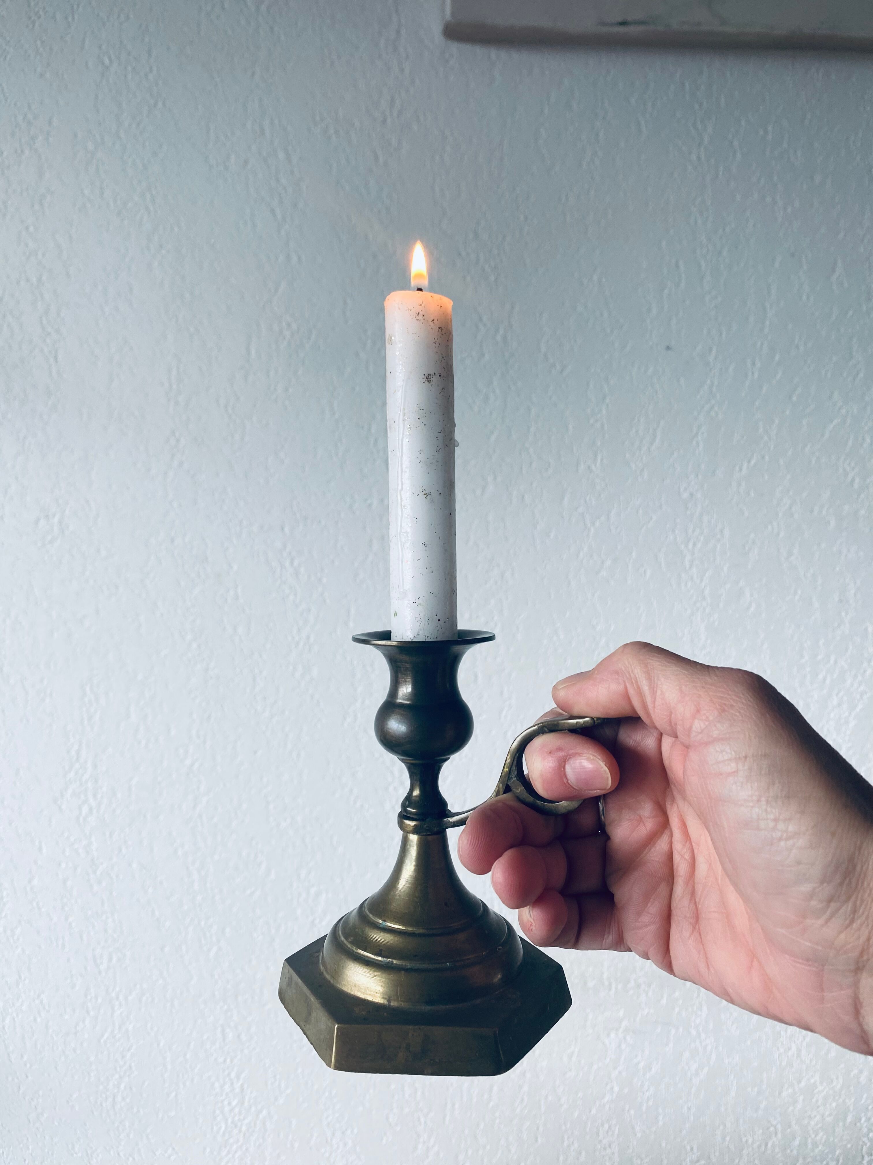 Candle holder with bronze handle